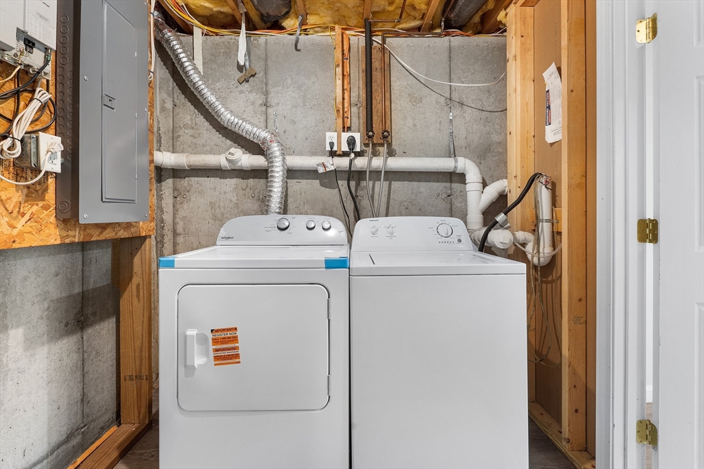 70 Loring Avenue Boxborough, MA 01719 - Photo 26 of 33 a utility room with dryer and washer