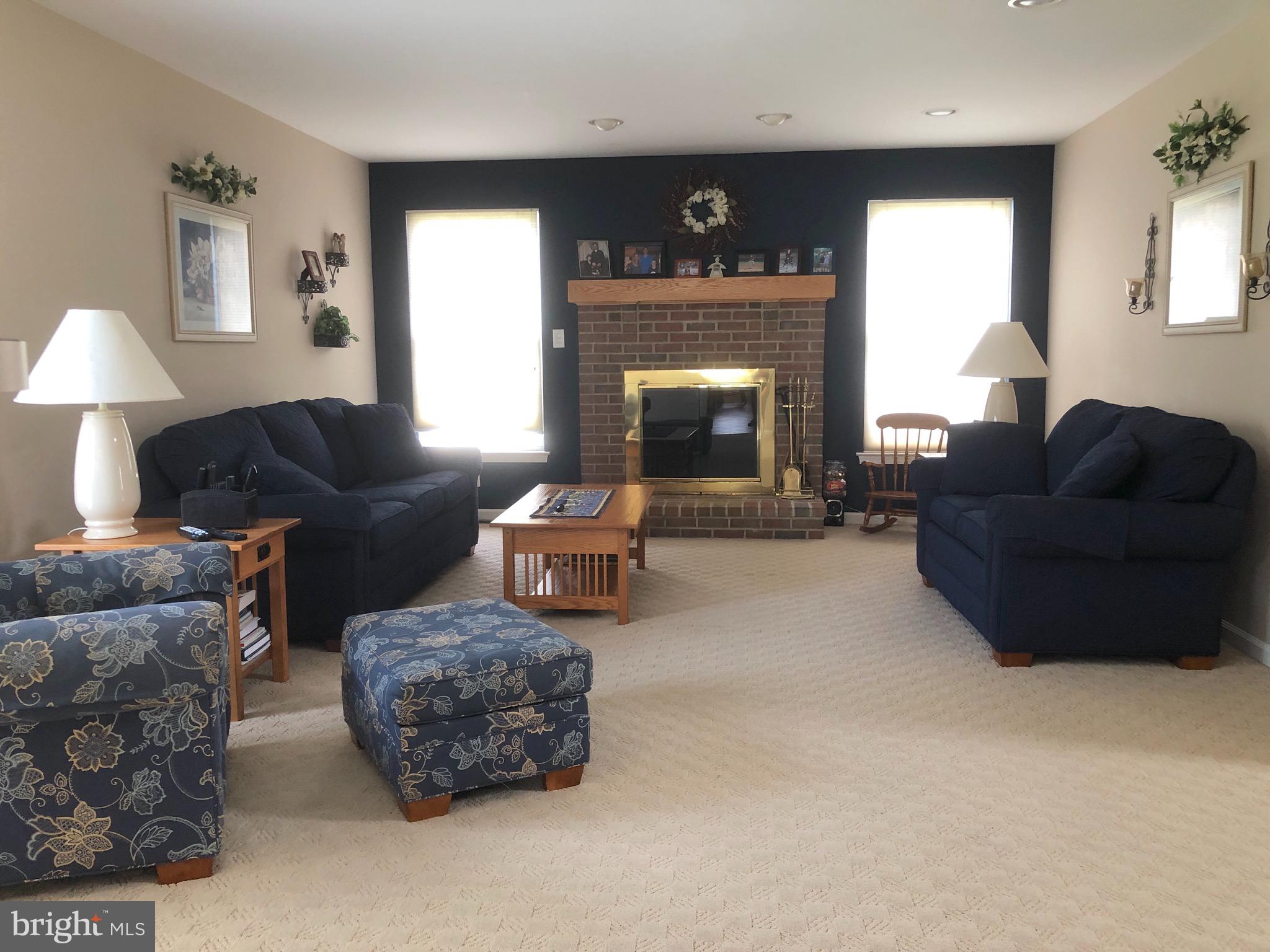 4 Rockingham Drive Marlton, NJ 08053 - Photo 13 of 46 a living room with furniture and a fireplace