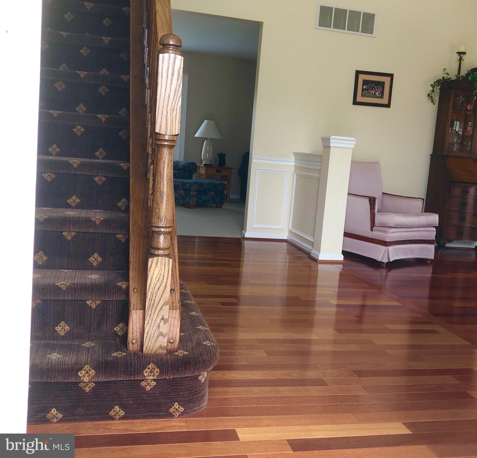 4 Rockingham Drive Marlton, NJ 08053 - Photo 3 of 46 a view of a hallway with wooden floor and furniture