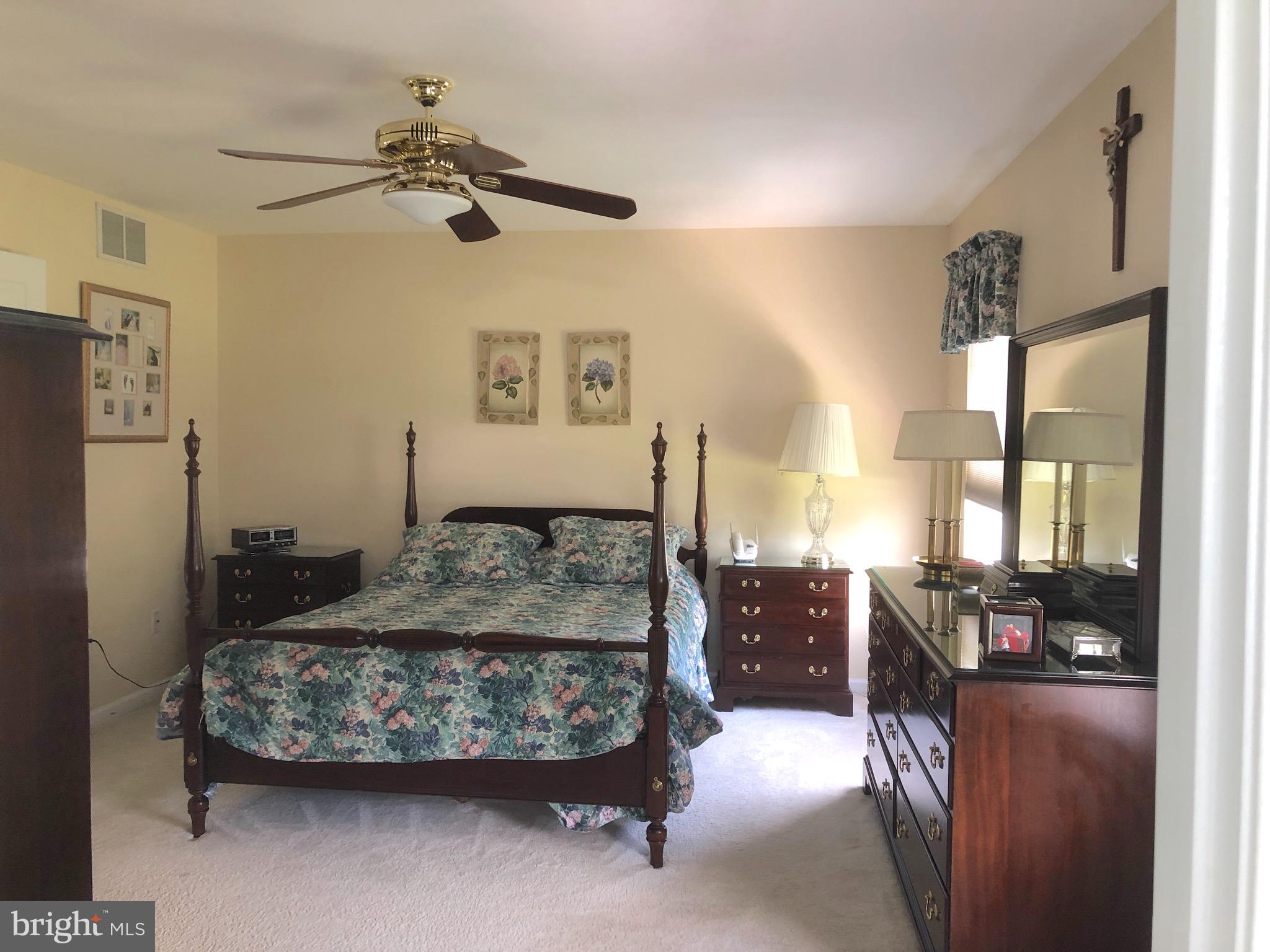 4 Rockingham Drive Marlton, NJ 08053 - Photo 29 of 46 a bedroom with a bed and wooden floor