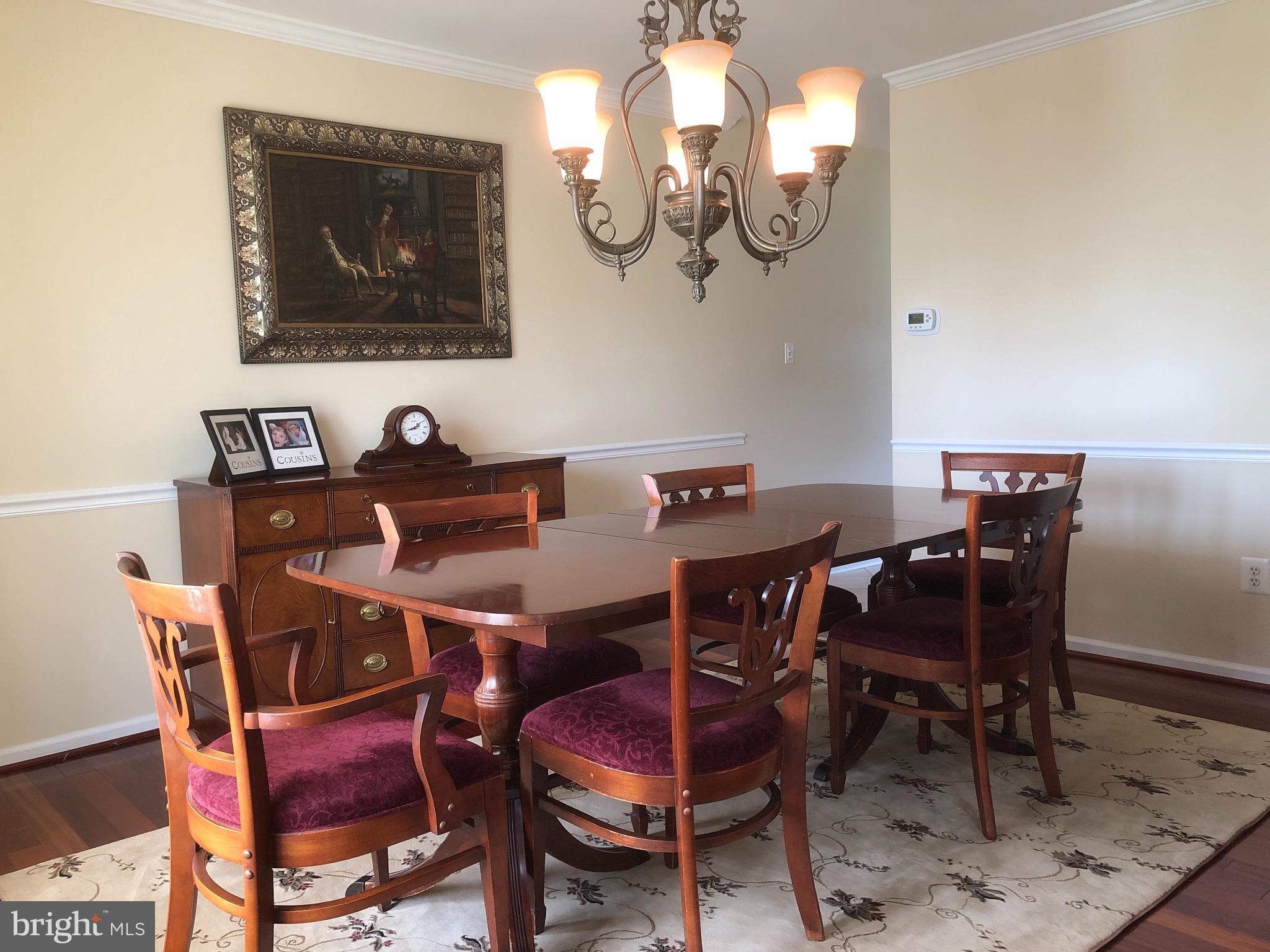 4 Rockingham Drive Marlton, NJ 08053 - Photo 8 of 46 a view of a dining room with furniture and chandelier
