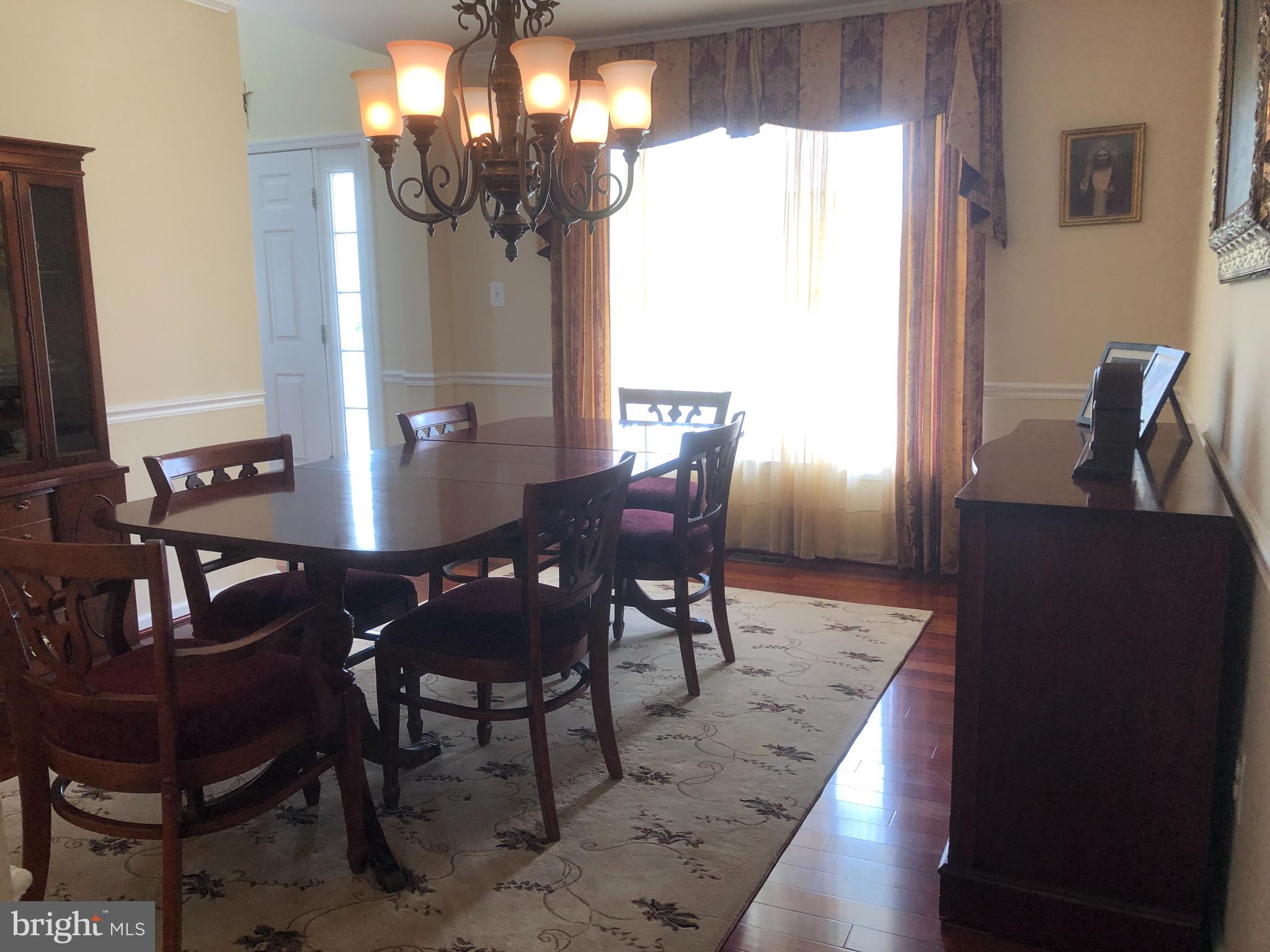 4 Rockingham Drive Marlton, NJ 08053 - Photo 10 of 46 a view of a dining room with furniture and window
