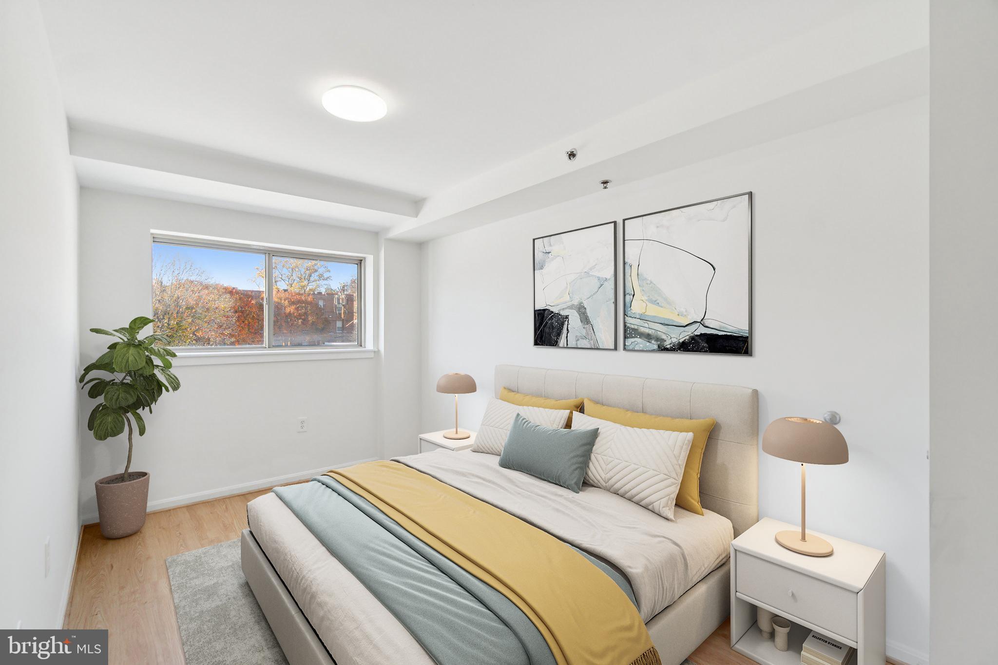 7981 Eastern Avenue Northwest, Unit 204 Silver Spring, MD 20910 - Photo 13 of 32 Virtually Staged - Primary Bedroom