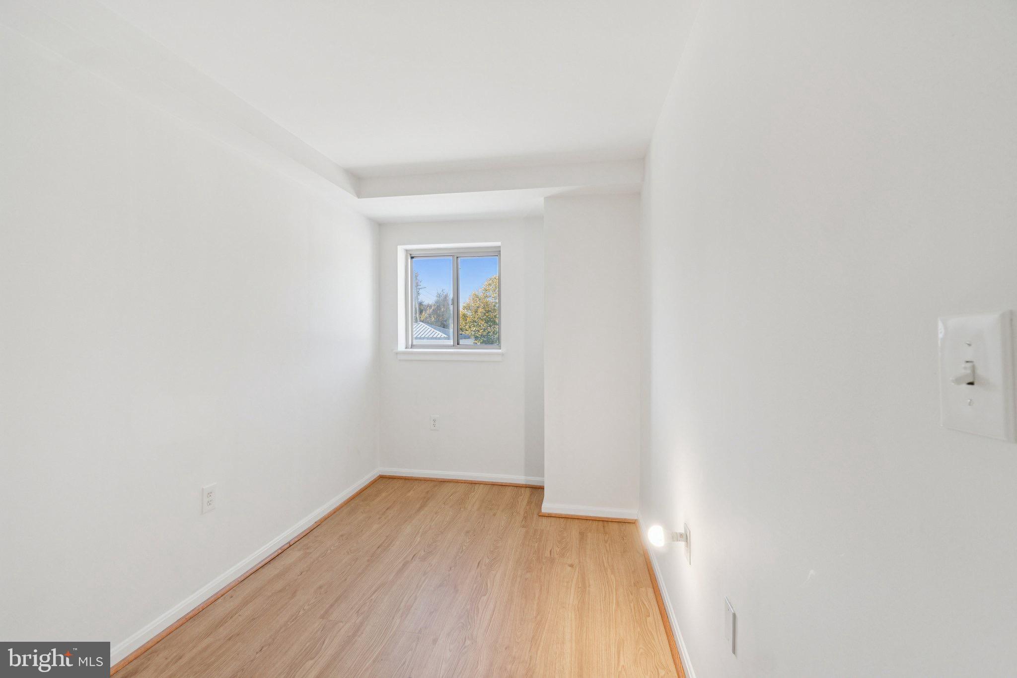 7981 Eastern Avenue Northwest, Unit 204 Silver Spring, MD 20910 - Photo 18 of 32 Bright bonus room (office-flex space-baby room)
