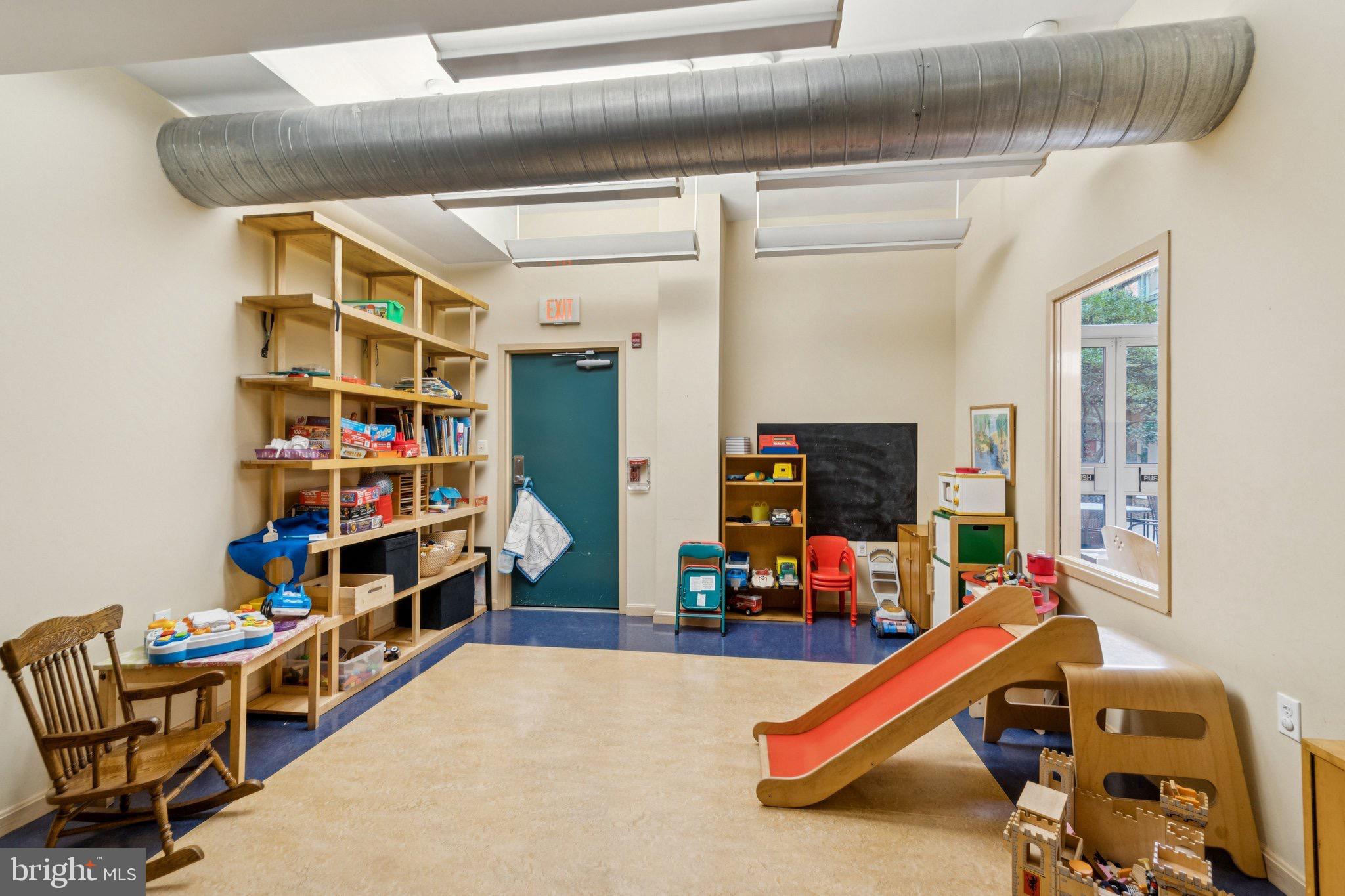 7981 Eastern Avenue Northwest, Unit 204 Silver Spring, MD 20910 - Photo 26 of 32 Bright and inviting playroom for children