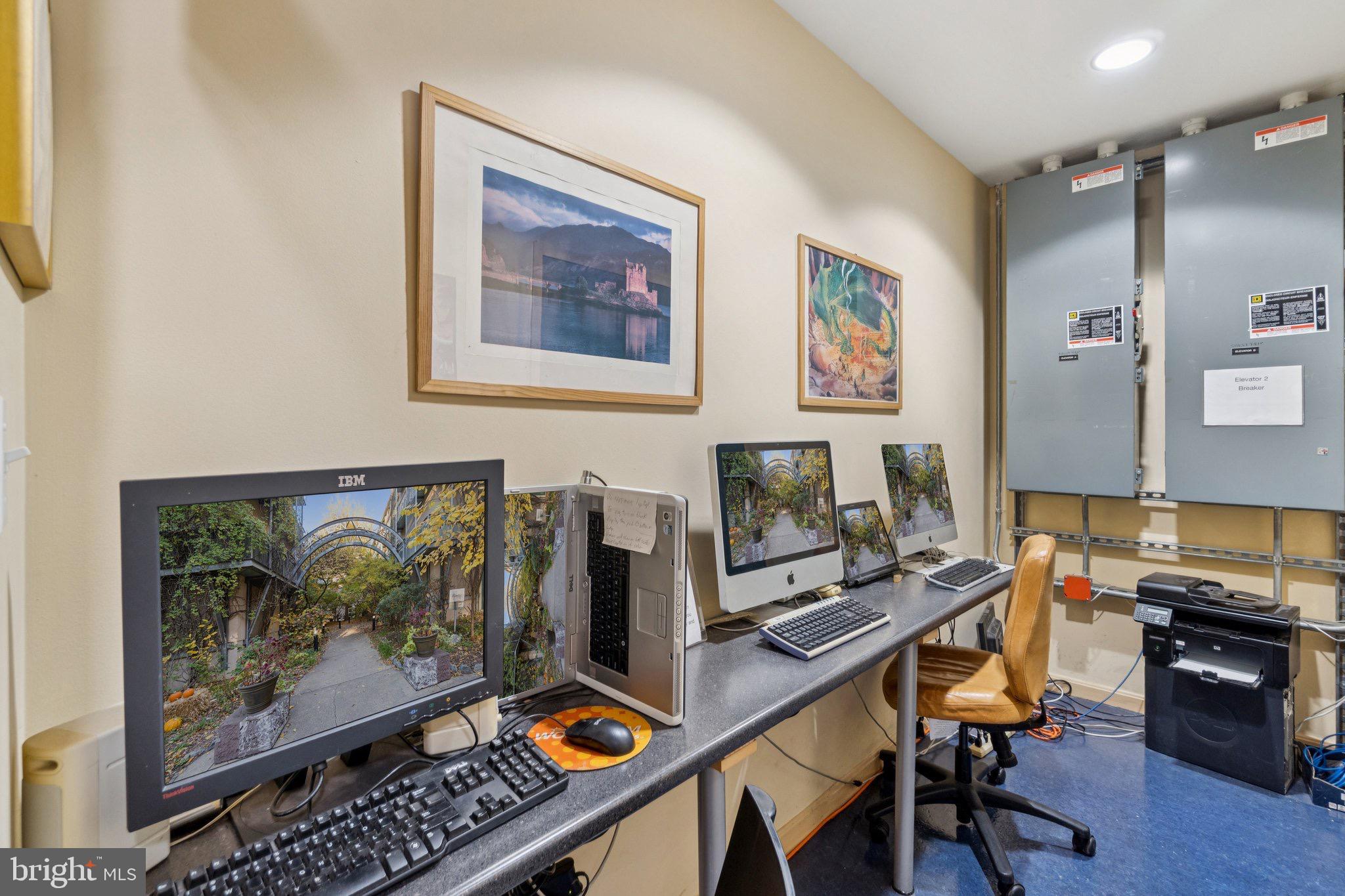 7981 Eastern Avenue Northwest, Unit 204 Silver Spring, MD 20910 - Photo 27 of 32 Technology workspace equipped with computers