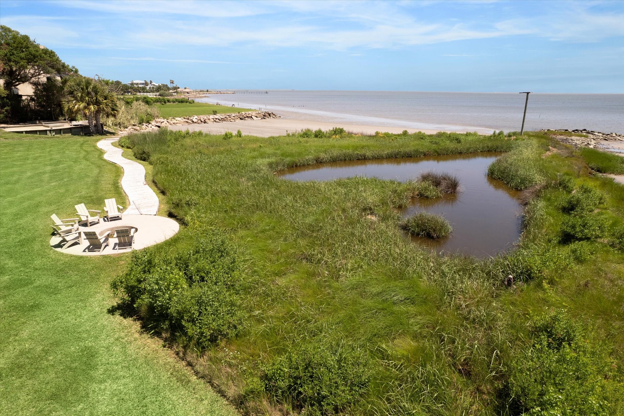 633 Quintana Roo Place Seabrook, TX 77586 - Photo 5 of 47 With unobstructed views of the entire bay and your own coastal pond, you can watch a variety of seabirds in their native habitat.