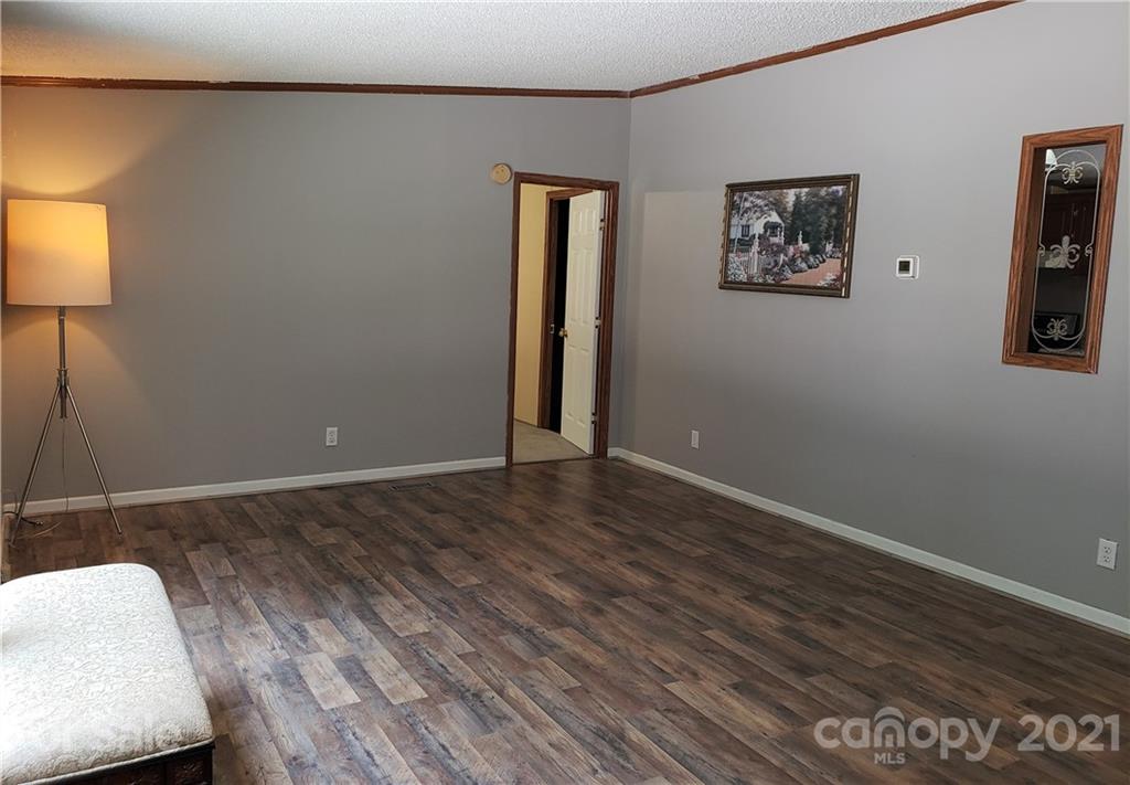 2012 State Rd S-46-168 York, SC 29745 - Photo 11 of 48 a view of an empty room and wooden floor