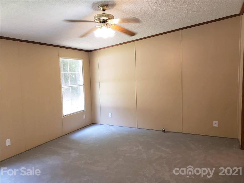 2012 State Rd S-46-168 York, SC 29745 - Photo 15 of 48 an empty room with windows and fan