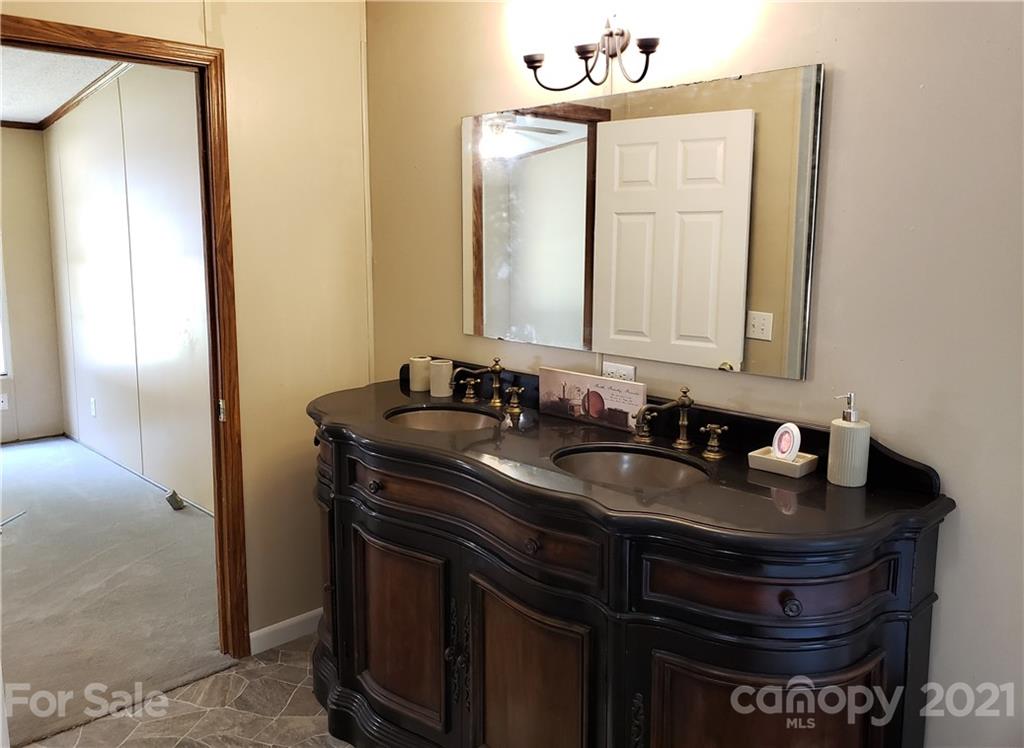 2012 State Rd S-46-168 York, SC 29745 - Photo 17 of 48 a bathroom with a sink and a mirror