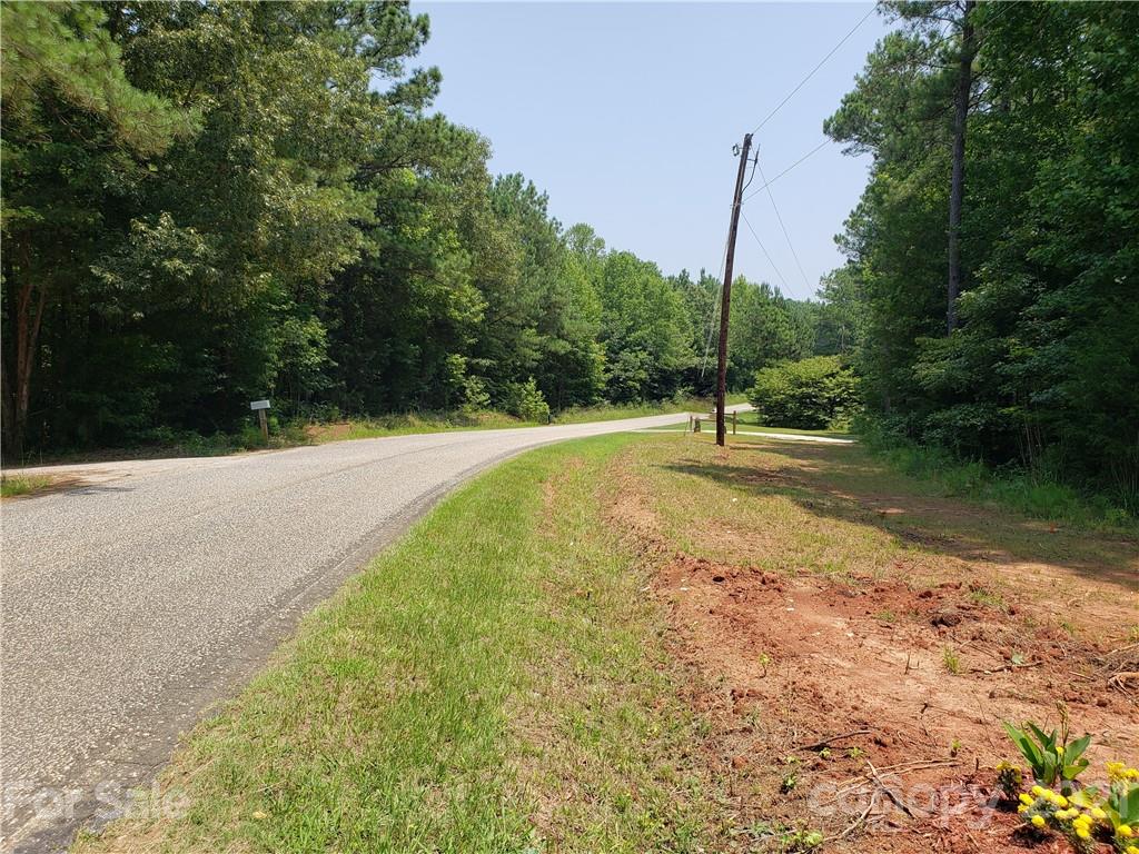 2012 State Rd S-46-168 York, SC 29745 - Photo 37 of 48 a swimming pool with some trees in the background