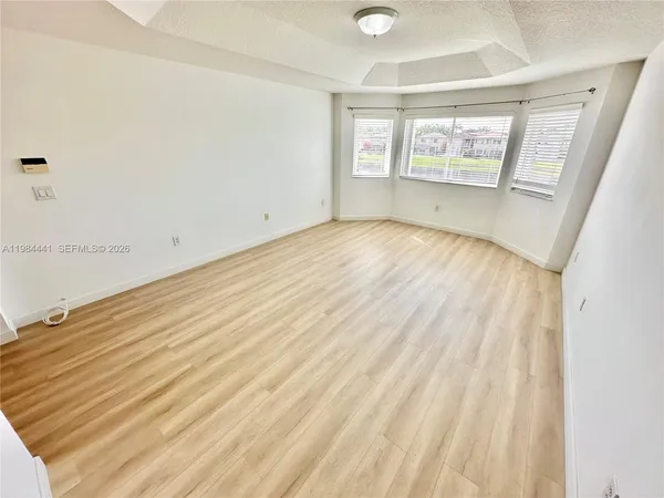 a view of a lake with a city