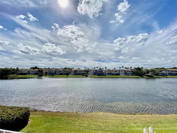 a view of a lake with a terrace