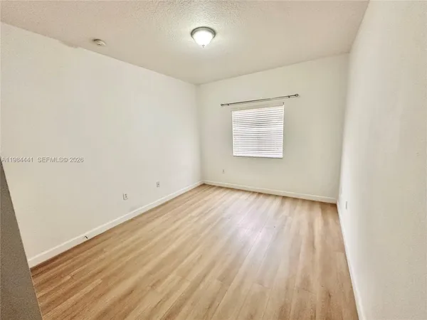 a view of a porch with a bench