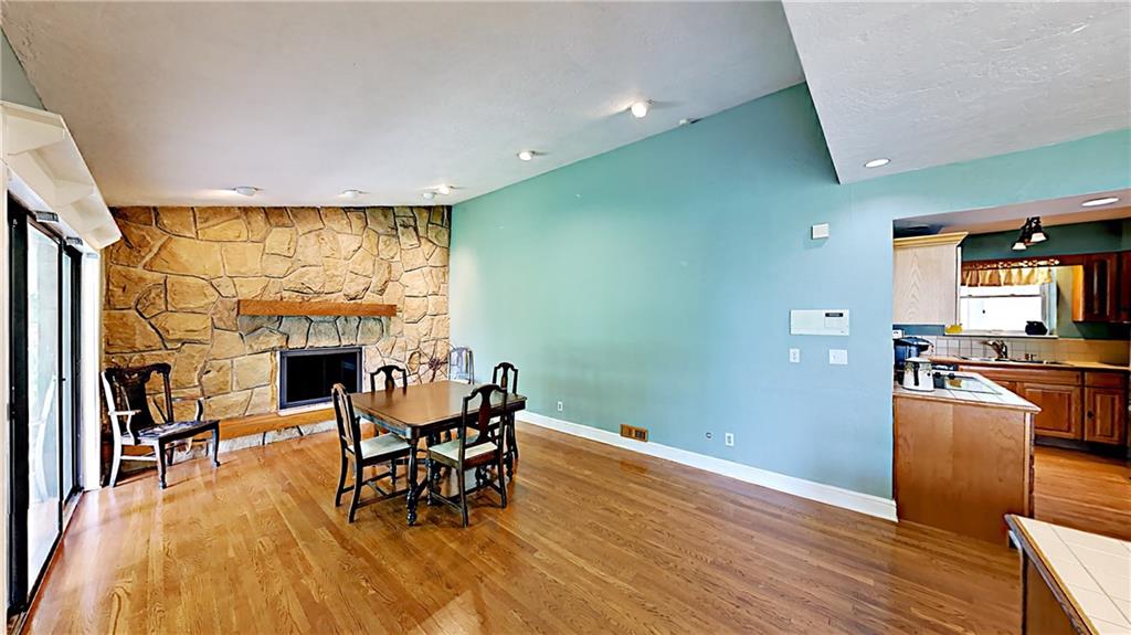 230 Highview Road Wexford, PA 15090 - Photo 13 of 25 Vaulted dining room with stone accent wall