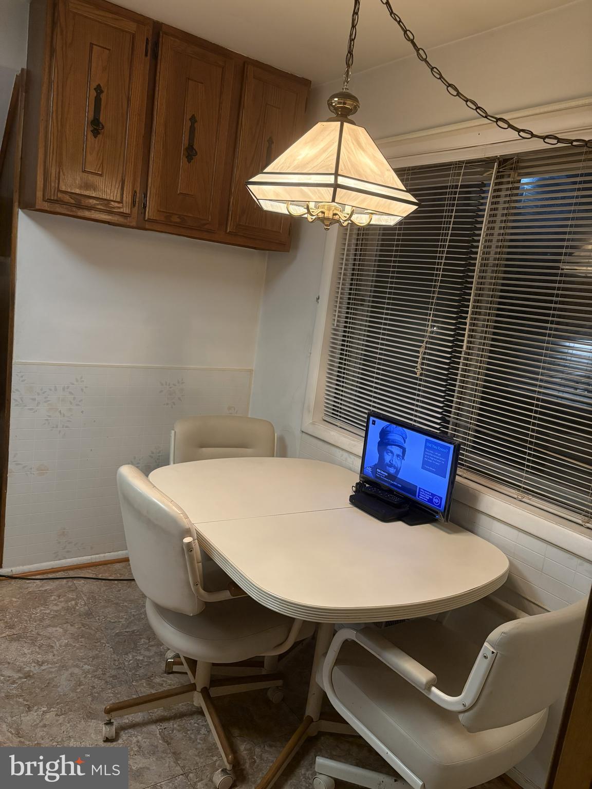 4523 Kinmount Road Lanham, MD 20706 - Photo 15 of 38 a view of a dining room with furniture