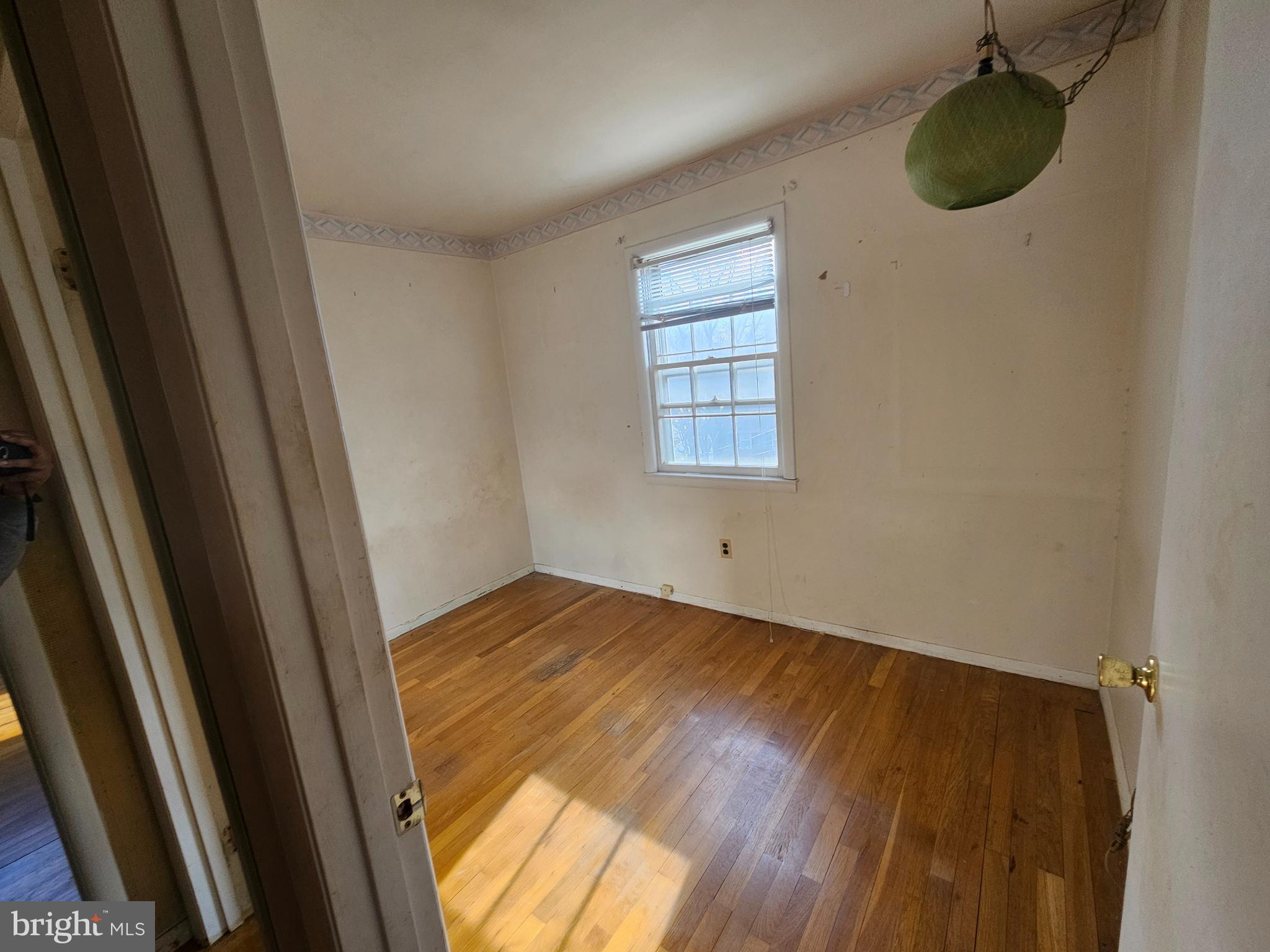4523 Kinmount Road Lanham, MD 20706 - Photo 22 of 38 a view of a room with wooden floor and window