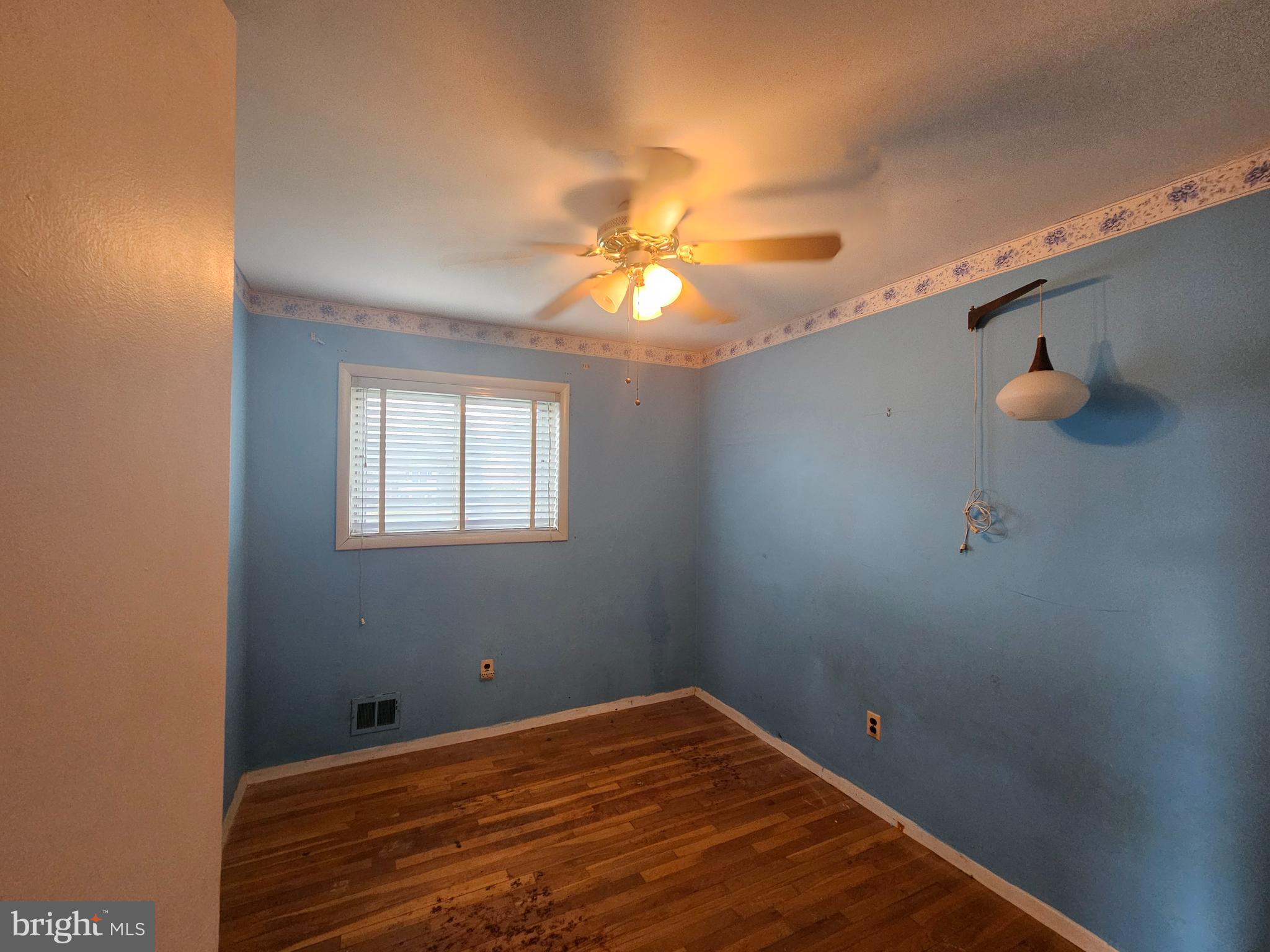 4523 Kinmount Road Lanham, MD 20706 - Photo 25 of 38 a view of a room with a fan and a window
