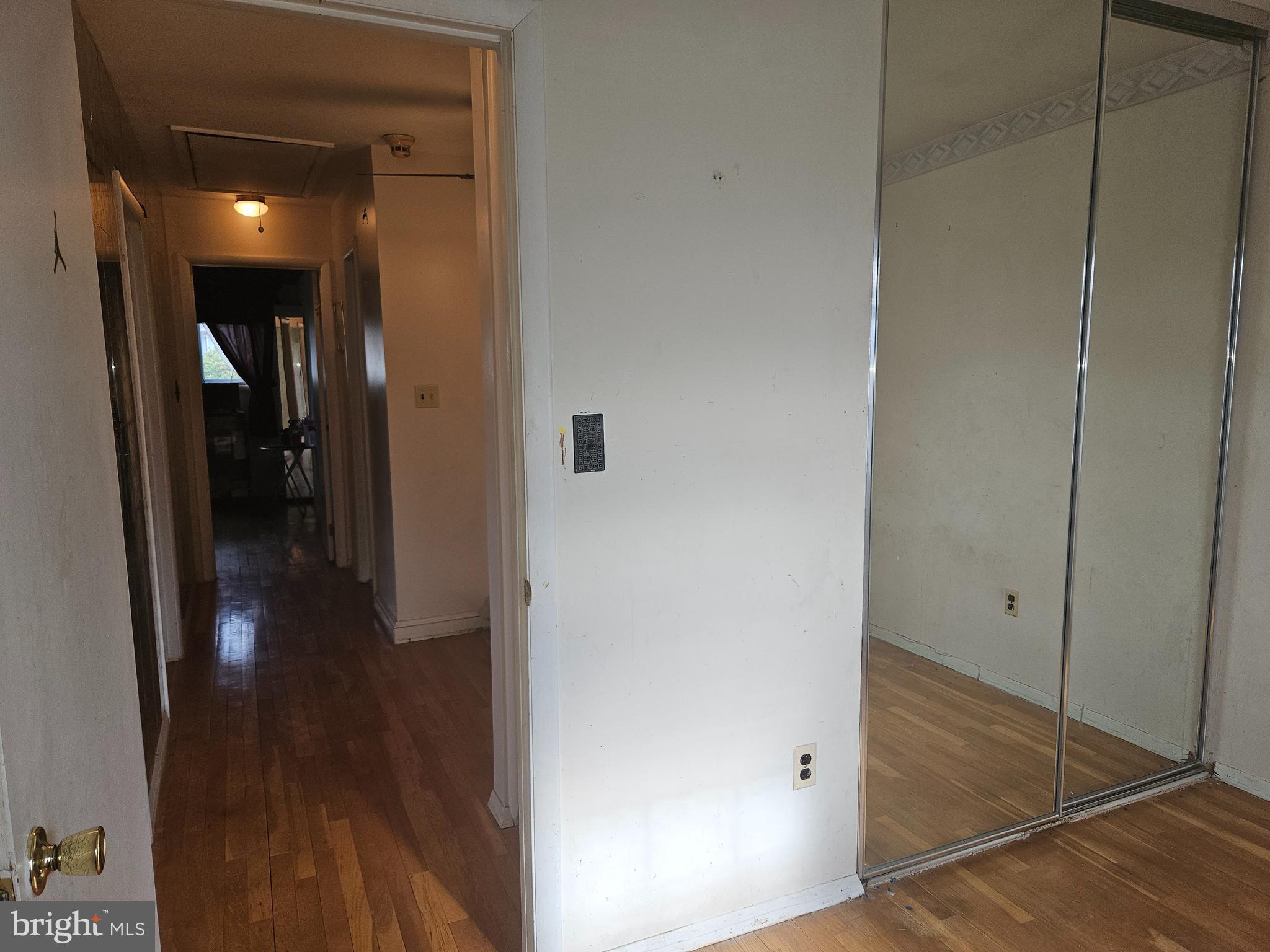 4523 Kinmount Road Lanham, MD 20706 - Photo 28 of 38 a view of a hallway with wooden floor