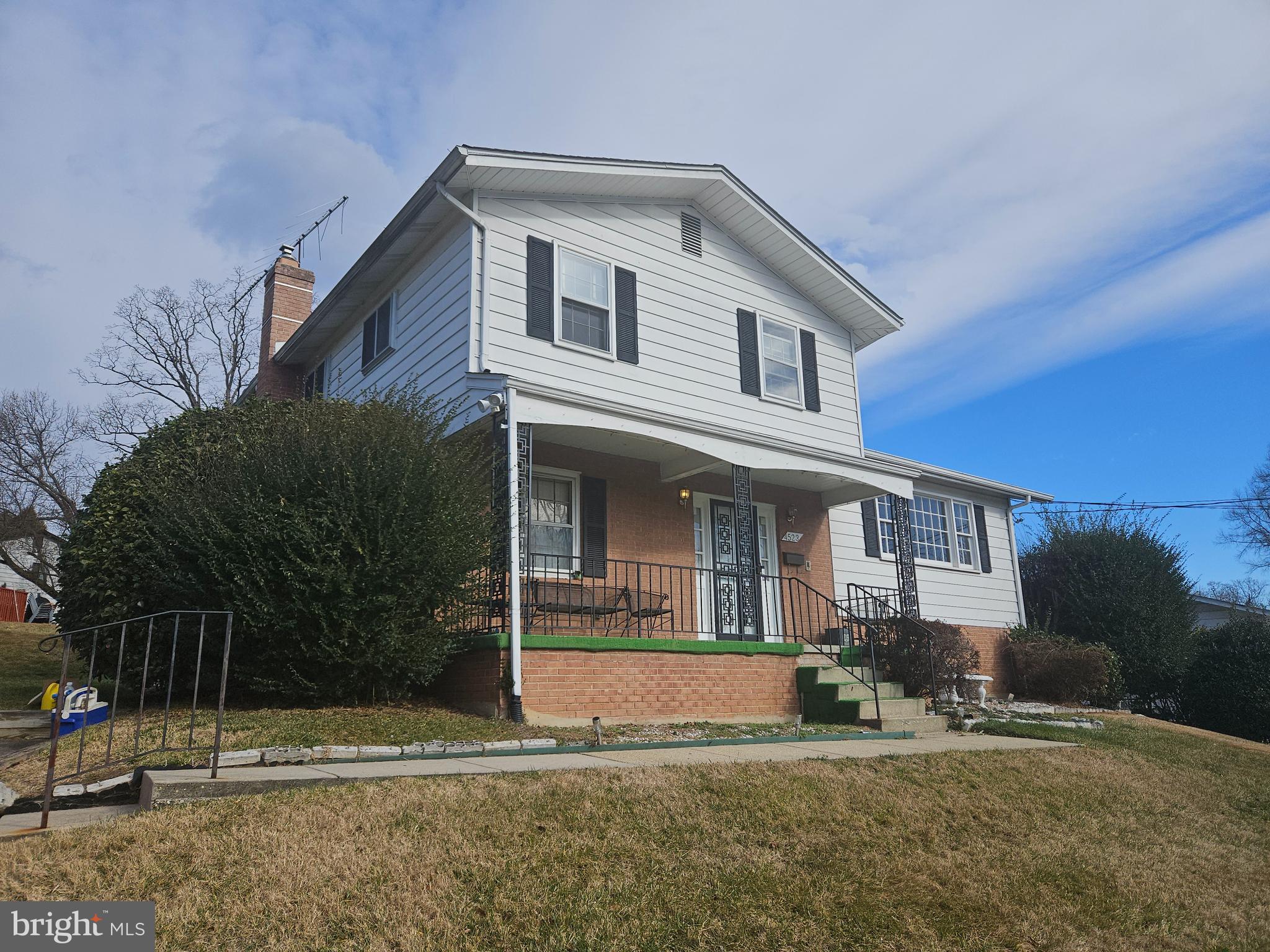 4523 Kinmount Road Lanham, MD 20706 - Photo 3 of 38 a front view of a house with a yard