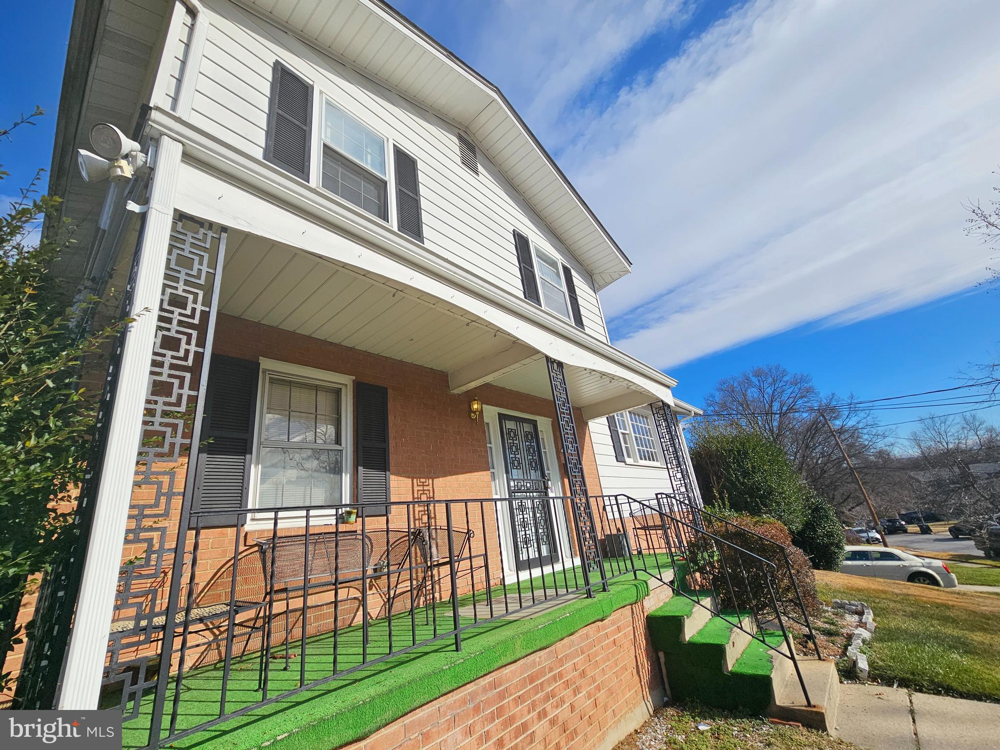 4523 Kinmount Road Lanham, MD 20706 - Photo 5 of 38 a front view of a house with garden