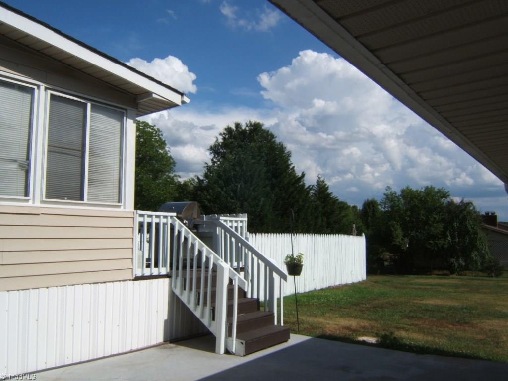 2991 Hickory Tree Road Winston-Salem, NC 27127 - Photo 18 of 26 Concrete patio/breezeway.