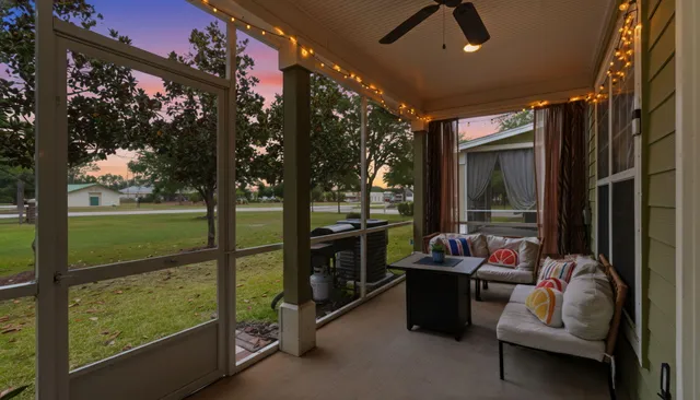 a outdoor living space with furniture and garden view