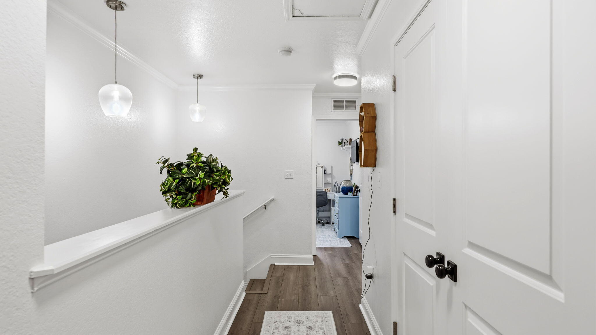 22 North Sand Palm Road, Unit 15 Freeport, FL 32439 - Photo 13 of 40 a view of a hallway with wooden floor and staircase
