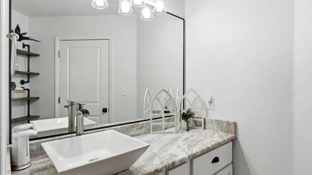a bathroom with a sink and a tub