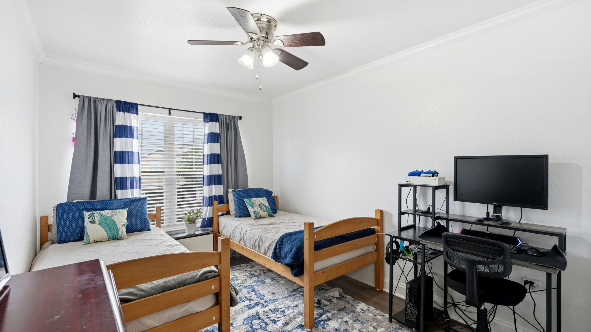 22 North Sand Palm Road, Unit 15 Freeport, FL 32439 - Photo 25 of 40 a bedroom with furniture and a flat screen tv