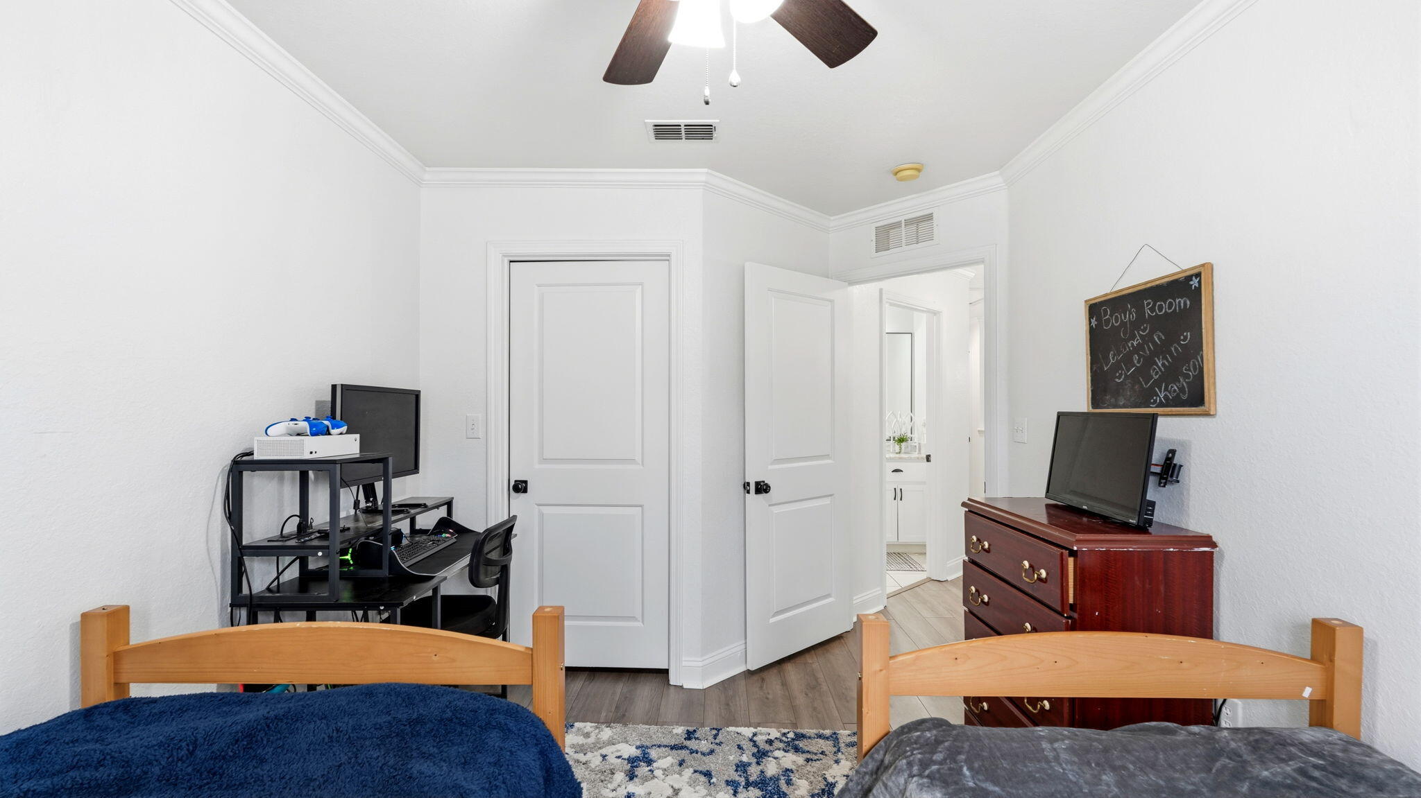 22 North Sand Palm Road, Unit 15 Freeport, FL 32439 - Photo 26 of 40 a living room with furniture and a flat screen tv