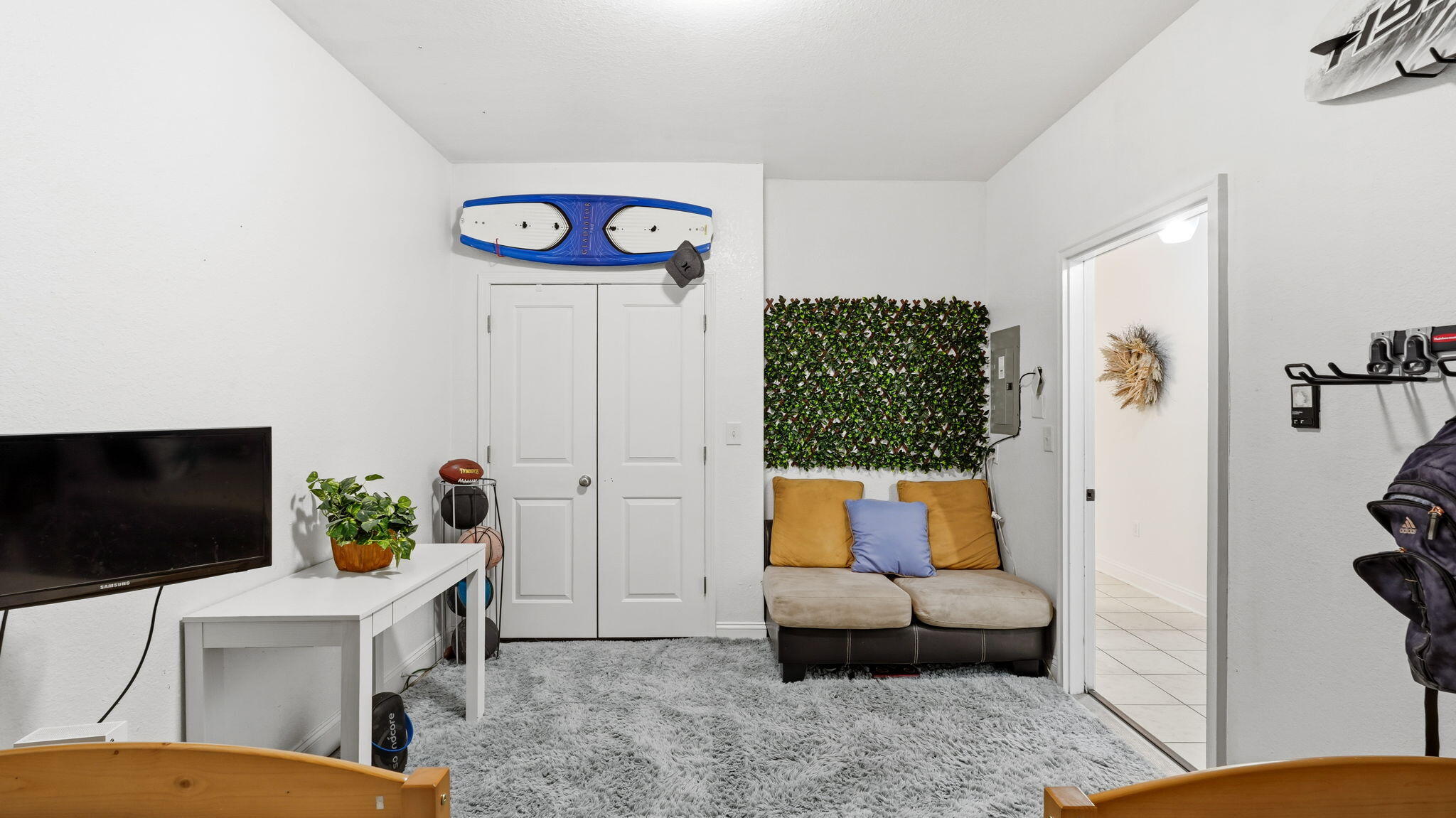 22 North Sand Palm Road, Unit 15 Freeport, FL 32439 - Photo 38 of 40 a living room with furniture and a flat screen tv