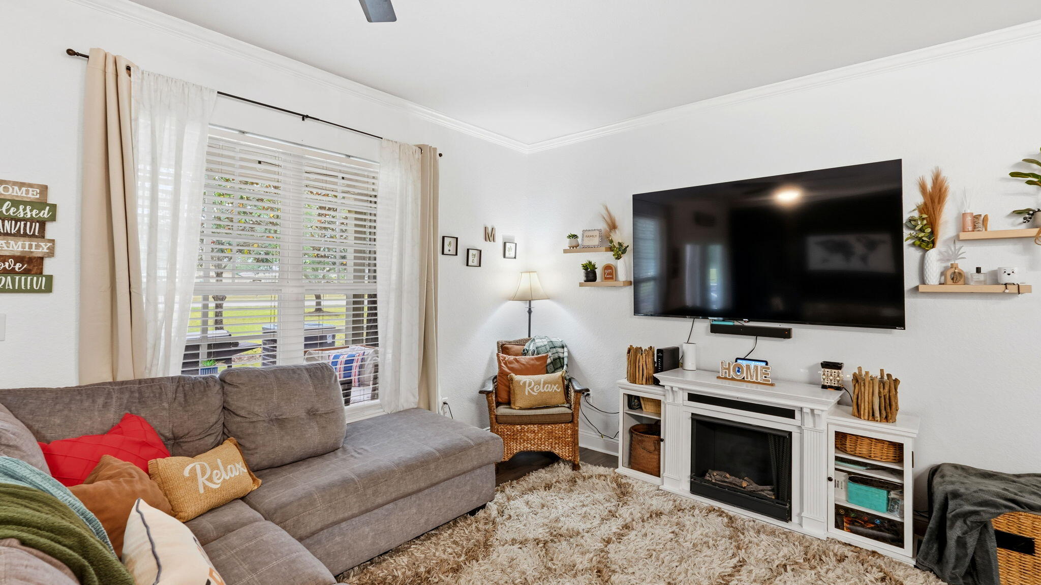 22 North Sand Palm Road, Unit 15 Freeport, FL 32439 - Photo 10 of 40 a living room with furniture and a flat screen tv