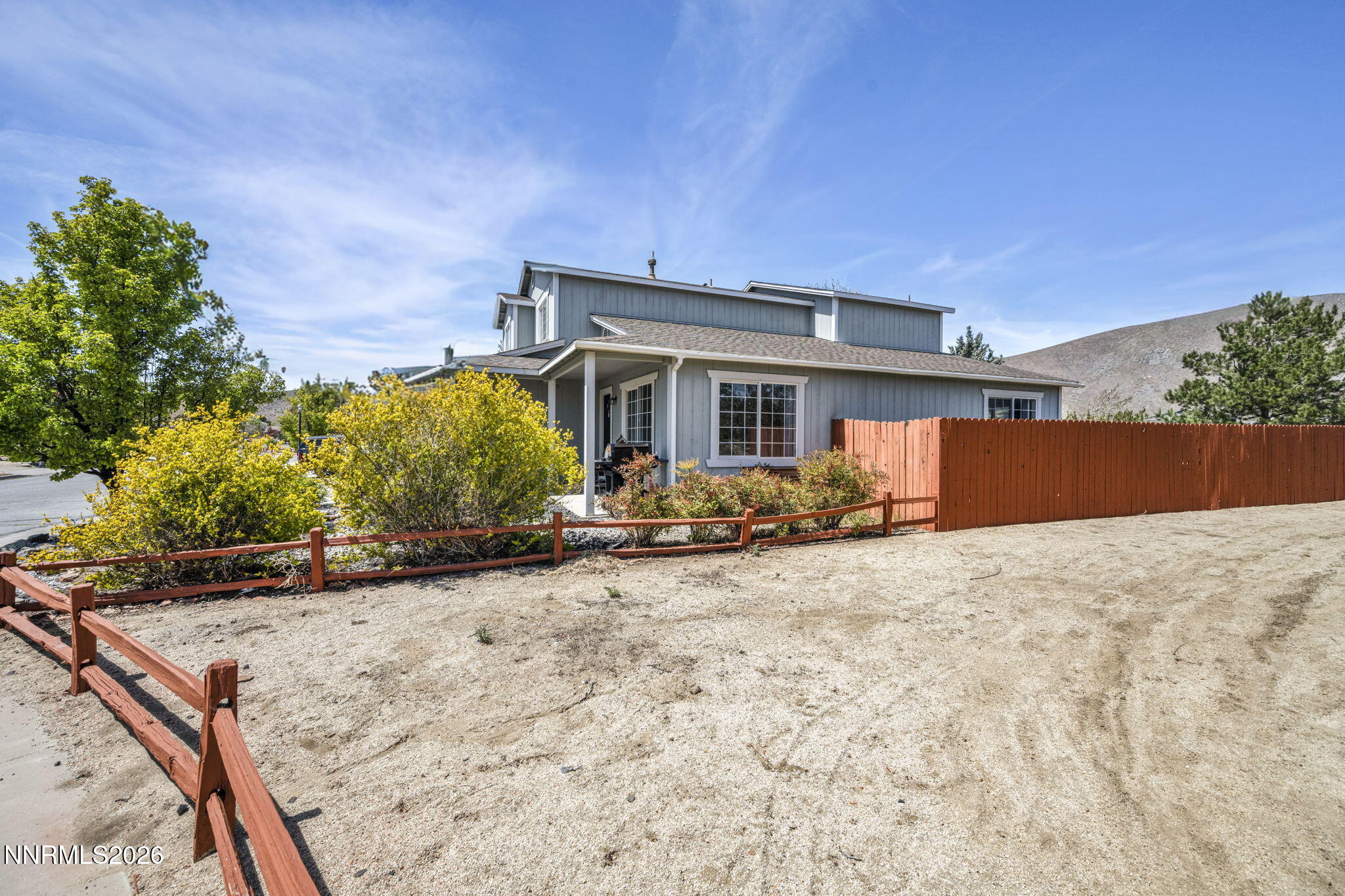 17615 Baileyville Court Reno, NV 89508 - Photo 2 of 19 front view of a house with a yard