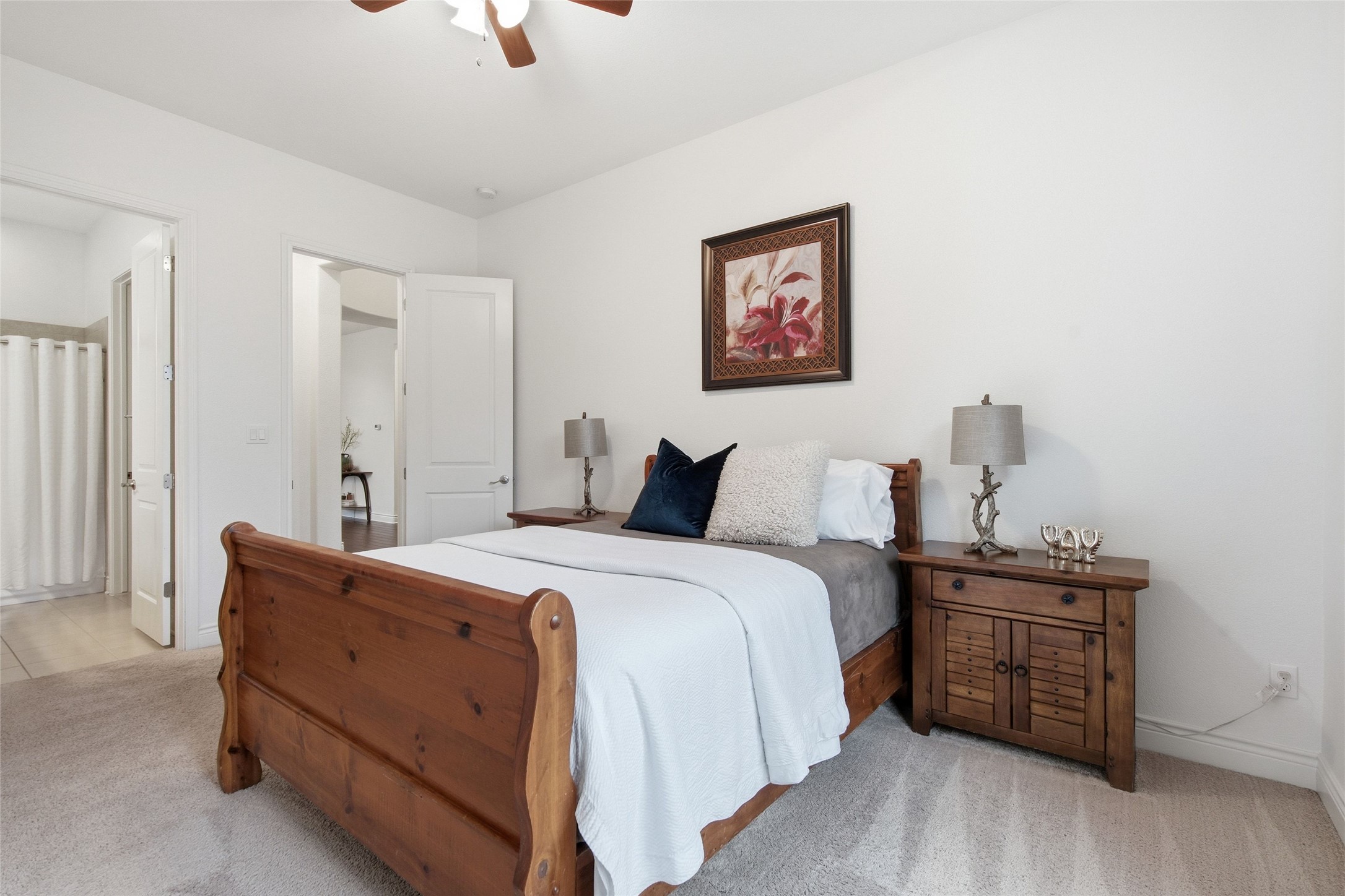 23315 Nameless Road Leander, TX 78641 - Photo 21 of 40 Main Home - Downstairs guest bedroom with attached full bathroom