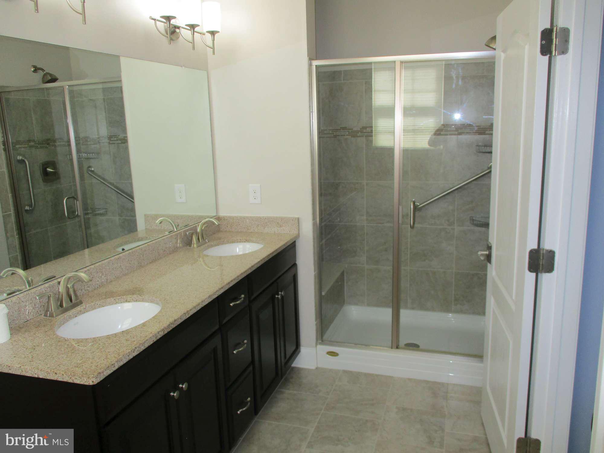 3 Montclaire Road Medford, NJ 08055 - Photo 15 of 23 a bathroom with a shower sink vanity granite and mirror