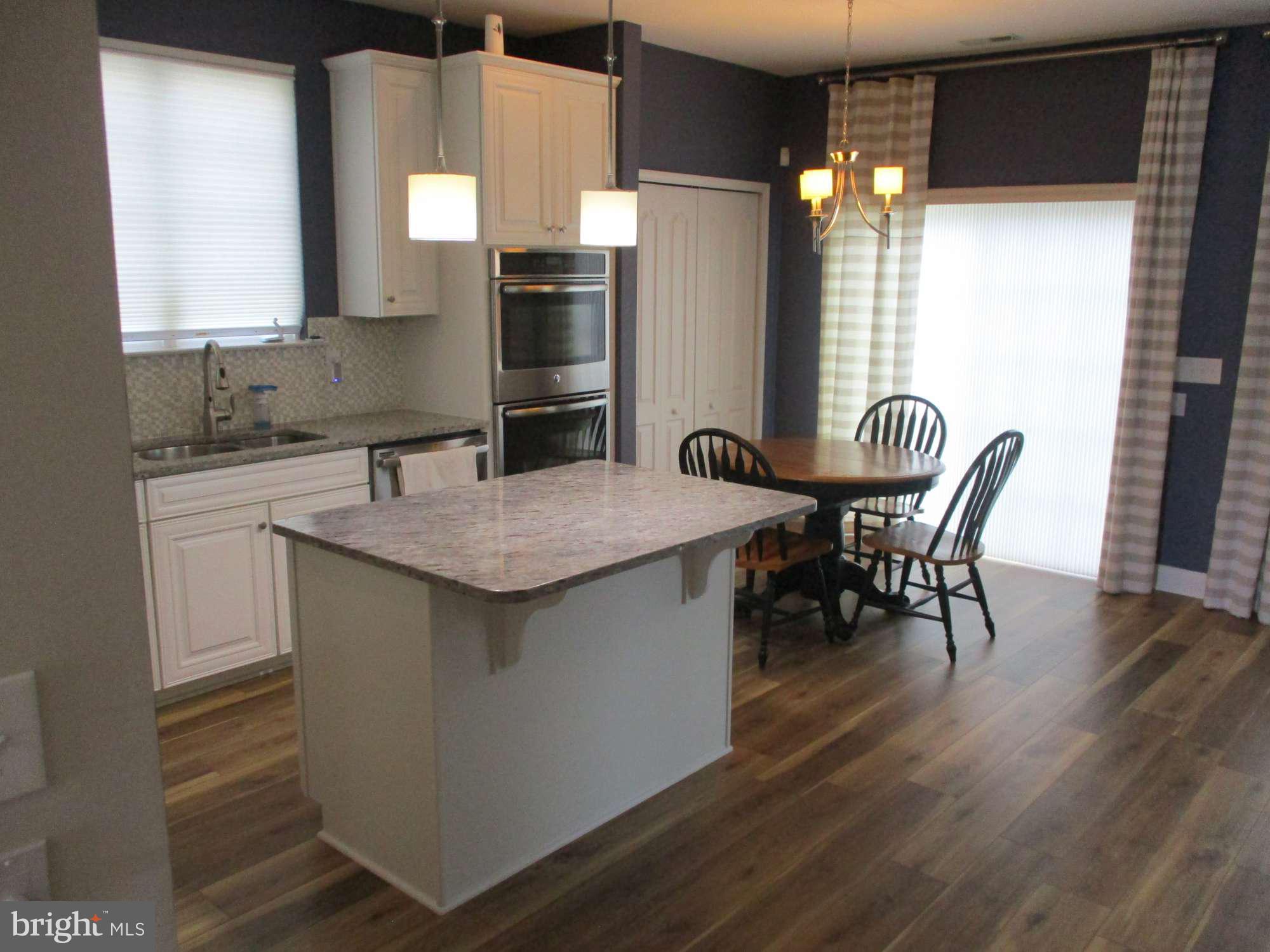3 Montclaire Road Medford, NJ 08055 - Photo 9 of 23 a kitchen with granite countertop a sink cabinets and window