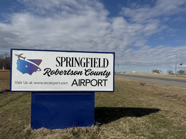 a view of outdoor space with signage