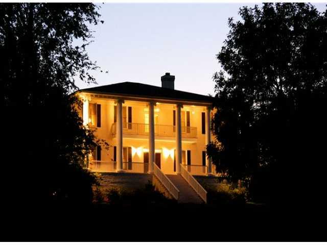 Exterior Front. NIGHT TIME VIEW