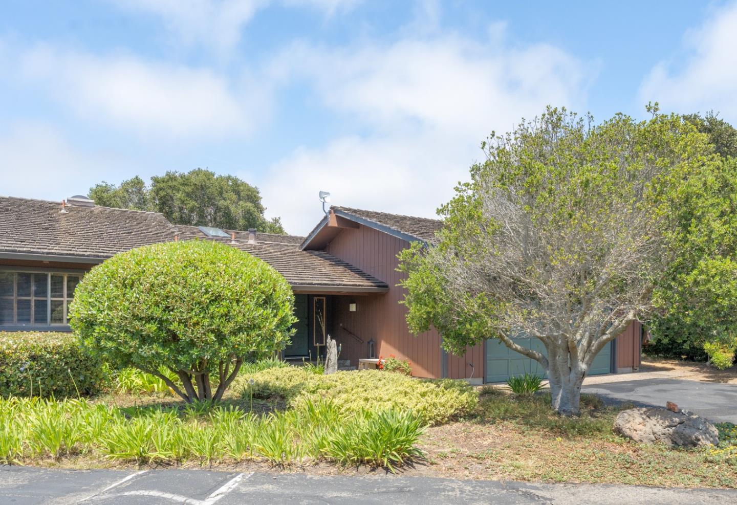 14004 Reservation Road Salinas, CA 93908 - Photo 1 of 1 a front view of a house with garden
