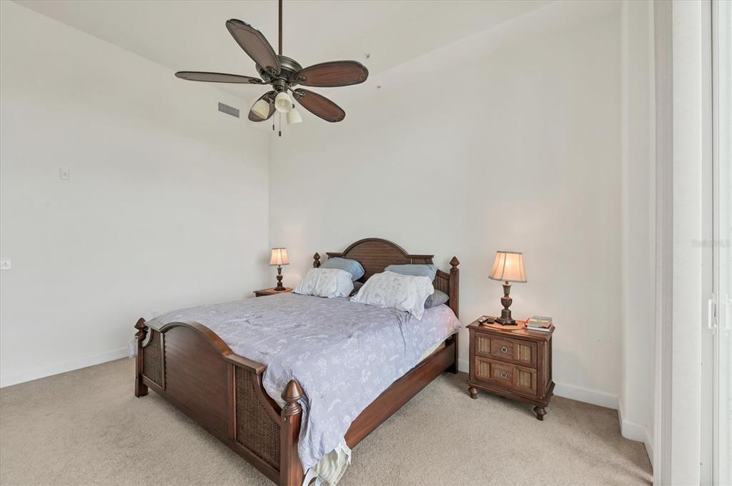1375 Beach Road, Unit 311 Englewood, FL 34223 - Photo 25 of 51 a bedroom with a bed and window
