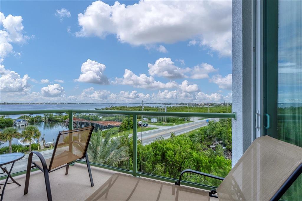 1375 Beach Road, Unit 311 Englewood, FL 34223 - Photo 35 of 51 a view of a chair and table in the balcony
