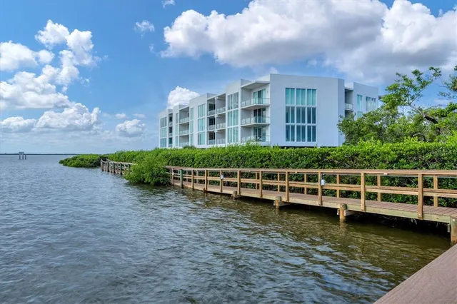 a view of a lake with a building in the background