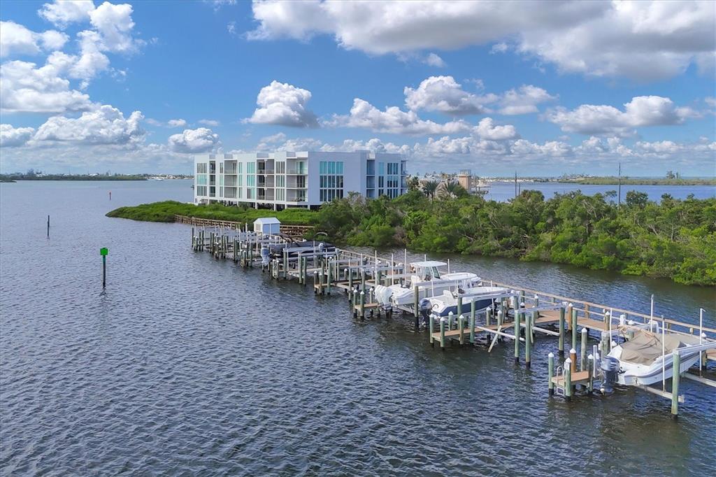 1375 Beach Road, Unit 311 Englewood, FL 34223 - Photo 42 of 51 a view of a lake from a yard