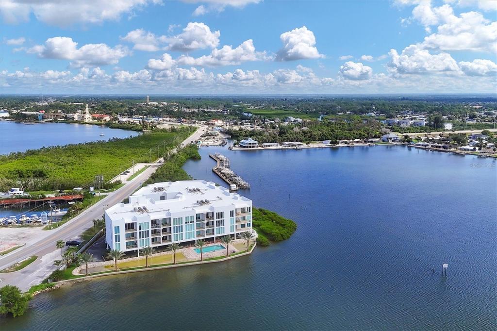 1375 Beach Road, Unit 311 Englewood, FL 34223 - Photo 48 of 51 an aerial view of a house with a lake view