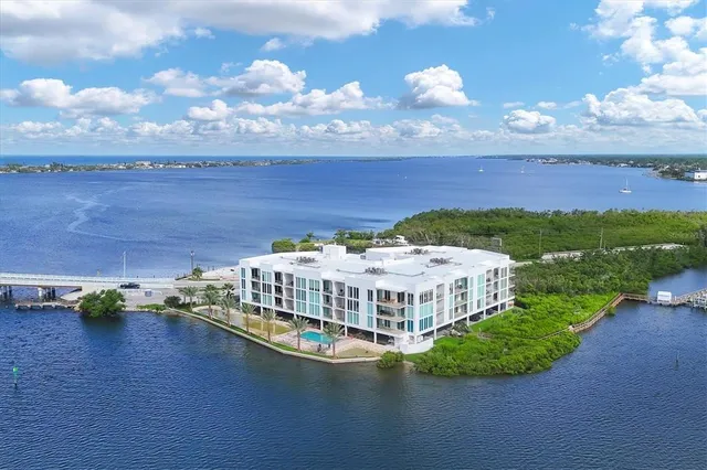 a view of a swimming pool and an outdoor seating