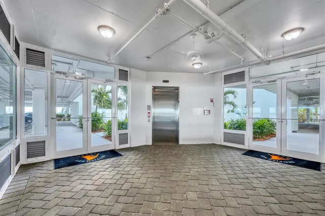 a view of a hallway with a chandelier