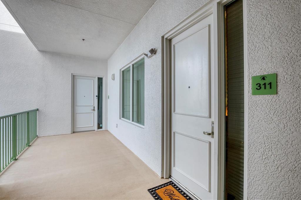 1375 Beach Road, Unit 311 Englewood, FL 34223 - Photo 9 of 51 a view of an empty room with a window