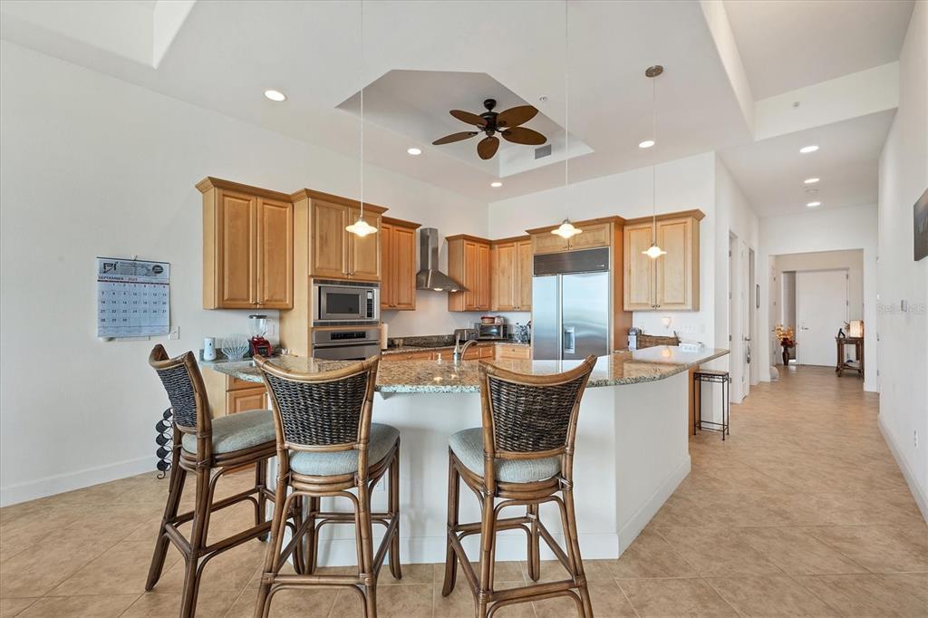 1375 Beach Road, Unit 311 Englewood, FL 34223 - Photo 10 of 51 a view of a dining room with furniture window and wooden floor