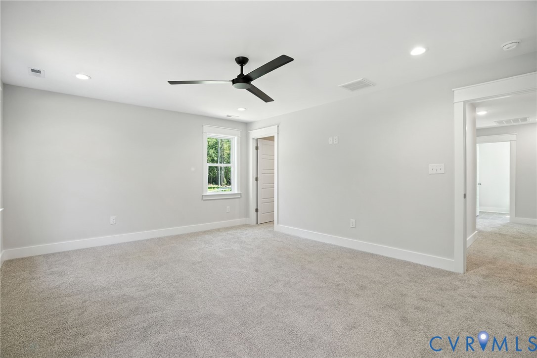 Tbd Lot 3 Rocky Ford Road Beaverdam, VA 23015 - Photo 20 of 40 an empty room with windows and fan